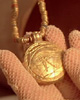 A strange gold charm